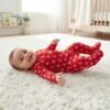 Nottingham Forest FC Official Baby Footed Romper | Red All-Over Print Sleepsuit with Integrated Footies