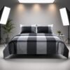 Grey and black plaid bedspread artfully draped over a studio bench with a matching pillow